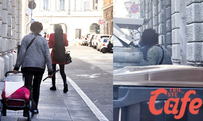 Anziana controlla nei cassonetti in via Trento: l’immagine che racconta la povertà silenziosa