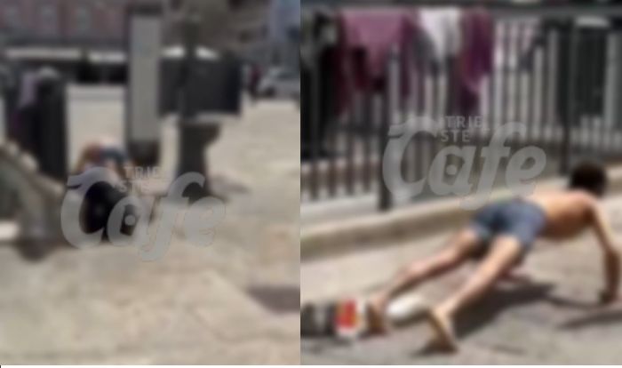 Piazza Ponterosso: giovane in mutande si lava, stende i panni e fa flessioni davanti a tutti (VIDEO)