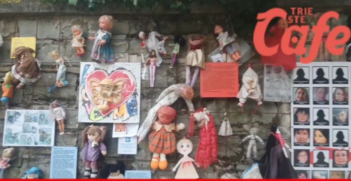 Trieste, una mimosa per abbattere il muro della violenza: iniziativa al Muro delle Bambole